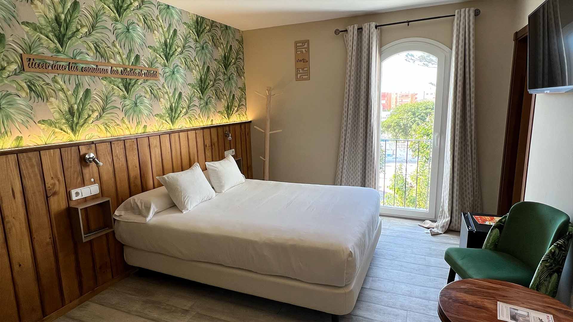 hostal alameda in tarifa with a bed